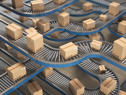 boxes moving across factory