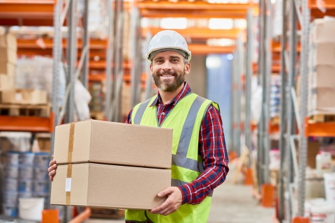 warehouse employee with boxes
