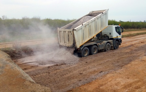 truck dumping sand