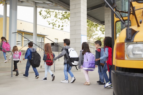 Students getting off bus