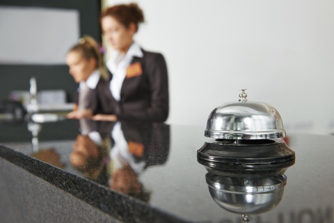 hotel desk with bell