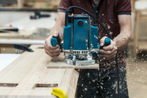 carpenter cutting wood