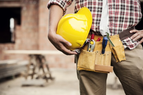 handyman with hard hat and tool belt