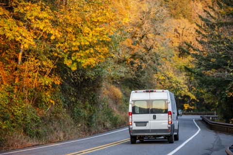 van driving down the road